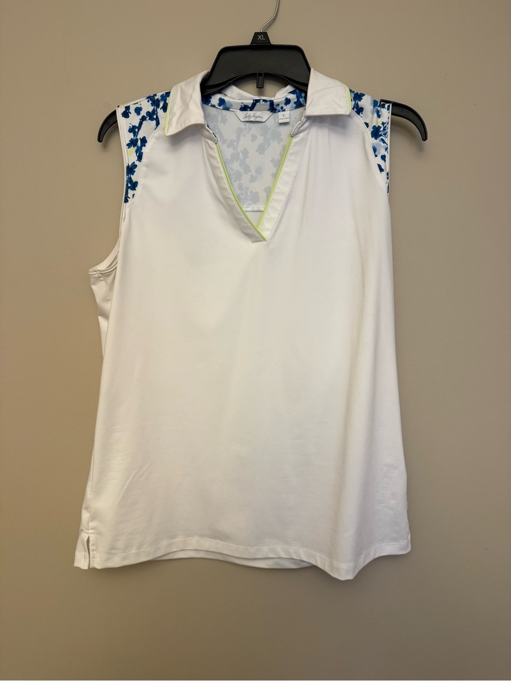 Sleeveless White Golf Top with Blue Floral Trim